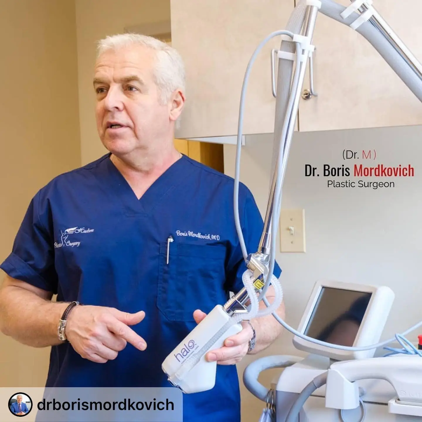 Dr. Boris Mordkovich holding Halo laser handpiece during treatment demonstration at Fort Lee clinic